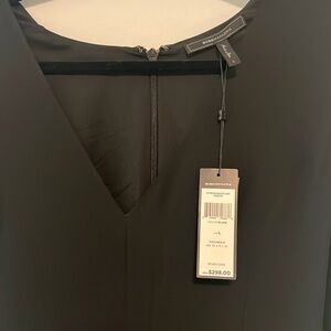 BCBG MaxAzria black jump suit with side train.